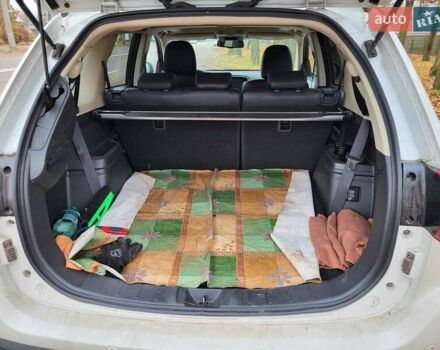 Белый Мицубиси Аутлендер, объемом двигателя 2.36 л и пробегом 55 тыс. км за 28000 $, фото 4 на Automoto.ua