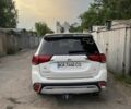 Білий Міцубісі Аутлендер, об'ємом двигуна 2.4 л та пробігом 125 тис. км за 21500 $, фото 2 на Automoto.ua