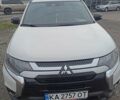 Білий Міцубісі Аутлендер, об'ємом двигуна 2.36 л та пробігом 170 тис. км за 18200 $, фото 1 на Automoto.ua
