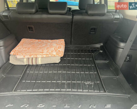 Белый Мицубиси Аутлендер, объемом двигателя 2.36 л и пробегом 59 тыс. км за 25000 $, фото 42 на Automoto.ua