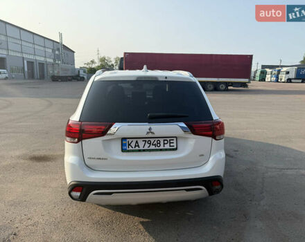 Білий Міцубісі Аутлендер, об'ємом двигуна 2.36 л та пробігом 84 тис. км за 19999 $, фото 11 на Automoto.ua