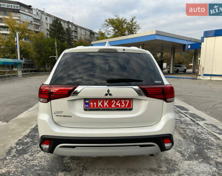 Білий Міцубісі Аутлендер, об'ємом двигуна 2.4 л та пробігом 69 тис. км за 17500 $, фото 3 на Automoto.ua