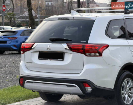 Білий Міцубісі Аутлендер, об'ємом двигуна 2 л та пробігом 52 тис. км за 21500 $, фото 18 на Automoto.ua