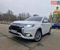 Белый Мицубиси Аутлендер, объемом двигателя 2 л и пробегом 116 тыс. км за 21500 $, фото 1 на Automoto.ua