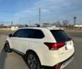 Білий Міцубісі Аутлендер, об'ємом двигуна 2.4 л та пробігом 92 тис. км за 29000 $, фото 2 на Automoto.ua