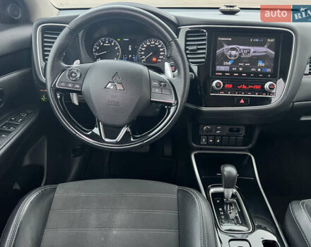 Белый Мицубиси Аутлендер, объемом двигателя 2.36 л и пробегом 59 тыс. км за 25000 $, фото 19 на Automoto.ua