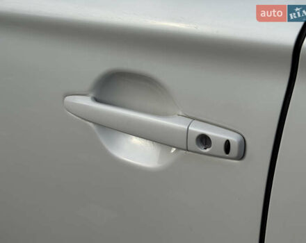 Білий Міцубісі Аутлендер, об'ємом двигуна 2 л та пробігом 52 тис. км за 21500 $, фото 12 на Automoto.ua