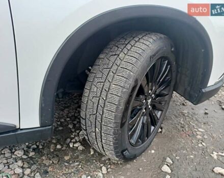 Білий Міцубісі Аутлендер, об'ємом двигуна 2.36 л та пробігом 170 тис. км за 18200 $, фото 6 на Automoto.ua