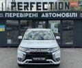 Белый Мицубиси Аутлендер, объемом двигателя 2.36 л и пробегом 113 тыс. км за 24900 $, фото 1 на Automoto.ua