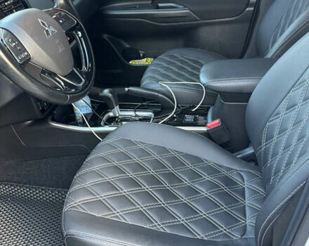 Белый Мицубиси Аутлендер, объемом двигателя 2 л и пробегом 143 тыс. км за 19999 $, фото 4 на Automoto.ua