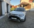 Білий Міцубісі Аутлендер, об'ємом двигуна 2 л та пробігом 85 тис. км за 23000 $, фото 4 на Automoto.ua