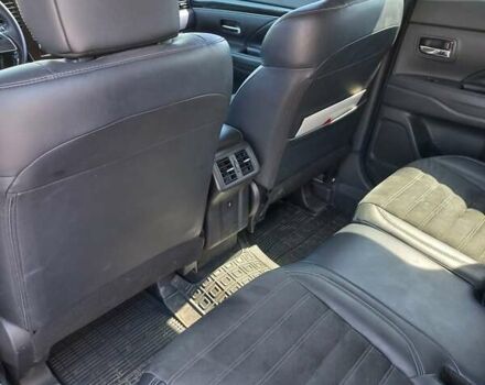 Белый Мицубиси Аутлендер, объемом двигателя 2 л и пробегом 96 тыс. км за 24000 $, фото 4 на Automoto.ua