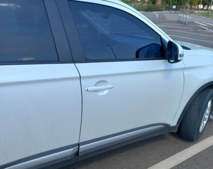 Белый Мицубиси Аутлендер, объемом двигателя 2 л и пробегом 97 тыс. км за 23564 $, фото 2 на Automoto.ua