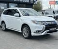 Белый Мицубиси Аутлендер, объемом двигателя 2.36 л и пробегом 113 тыс. км за 24900 $, фото 1 на Automoto.ua