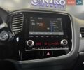 Белый Мицубиси Аутлендер, объемом двигателя 2 л и пробегом 30 тыс. км за 22500 $, фото 26 на Automoto.ua
