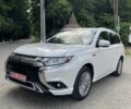 Белый Мицубиси Аутлендер, объемом двигателя 2.36 л и пробегом 94 тыс. км за 26200 $, фото 1 на Automoto.ua