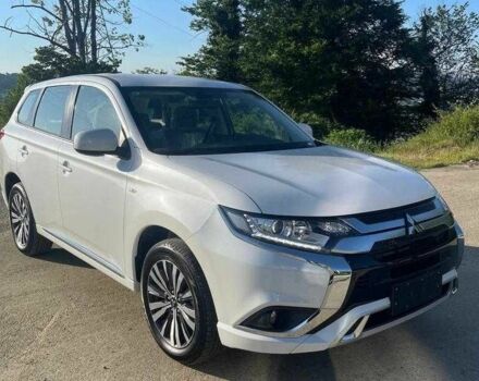 Белый Мицубиси Аутлендер, объемом двигателя 2 л и пробегом 77 тыс. км за 18200 $, фото 1 на Automoto.ua