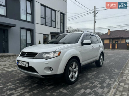 Белый Мицубиси Аутлендер, объемом двигателя 3 л и пробегом 312 тыс. км за 7850 $, фото 1 на Automoto.ua