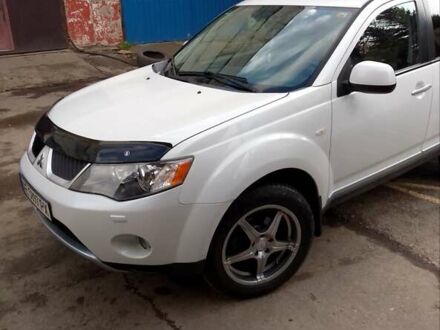 Белый Мицубиси Аутлендер, объемом двигателя 2.18 л и пробегом 275 тыс. км за 9500 $, фото 1 на Automoto.ua