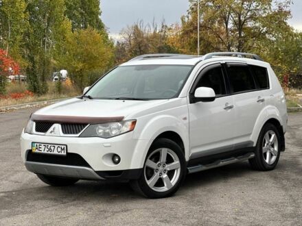 Білий Міцубісі Аутлендер, об'ємом двигуна 2.4 л та пробігом 160 тис. км за 9299 $, фото 1 на Automoto.ua