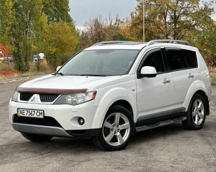 Білий Міцубісі Аутлендер, об'ємом двигуна 2.4 л та пробігом 160 тис. км за 9299 $, фото 1 на Automoto.ua