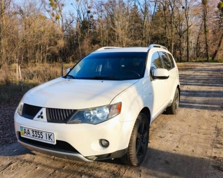 Белый Мицубиси Аутлендер, объемом двигателя 2.4 л и пробегом 149 тыс. км за 9000 $, фото 1 на Automoto.ua