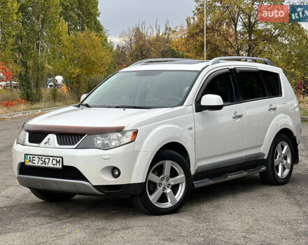 Білий Міцубісі Аутлендер, об'ємом двигуна 2.36 л та пробігом 160 тис. км за 9299 $, фото 1 на Automoto.ua