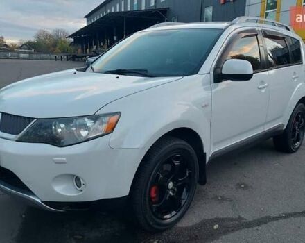 Белый Мицубиси Аутлендер, объемом двигателя 2.36 л и пробегом 185 тыс. км за 8950 $, фото 1 на Automoto.ua