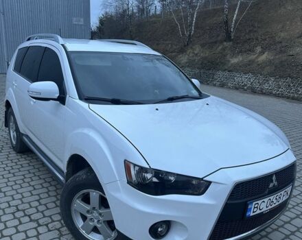 Білий Міцубісі Аутлендер, об'ємом двигуна 2.2 л та пробігом 234 тис. км за 10800 $, фото 1 на Automoto.ua