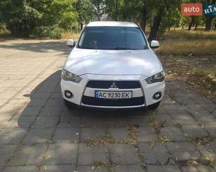 Білий Міцубісі Аутлендер, об'ємом двигуна 2.36 л та пробігом 212 тис. км за 8900 $, фото 1 на Automoto.ua