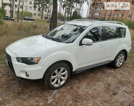 Белый Мицубиси Аутлендер, объемом двигателя 2.4 л и пробегом 63 тыс. км за 13800 $, фото 1 на Automoto.ua
