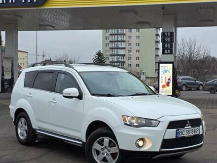 Білий Міцубісі Аутлендер, об'ємом двигуна 2.27 л та пробігом 243 тис. км за 9800 $, фото 1 на Automoto.ua