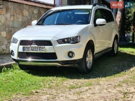 Білий Міцубісі Аутлендер, об'ємом двигуна 2.2 л та пробігом 194 тис. км за 10650 $, фото 1 на Automoto.ua