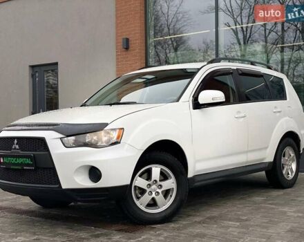 Белый Мицубиси Аутлендер, объемом двигателя 2 л и пробегом 248 тыс. км за 10490 $, фото 1 на Automoto.ua