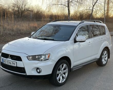 Белый Мицубиси Аутлендер, объемом двигателя 2.4 л и пробегом 161 тыс. км за 11700 $, фото 1 на Automoto.ua