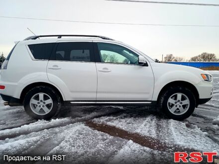 Білий Міцубісі Аутлендер, об'ємом двигуна 2 л та пробігом 149 тис. км за 10900 $, фото 1 на Automoto.ua