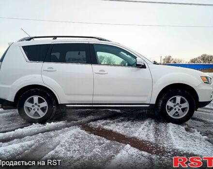 Белый Мицубиси Аутлендер, объемом двигателя 2 л и пробегом 149 тыс. км за 10900 $, фото 1 на Automoto.ua