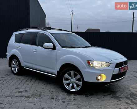 Белый Мицубиси Аутлендер, объемом двигателя 2.3 л и пробегом 161 тыс. км за 11150 $, фото 1 на Automoto.ua