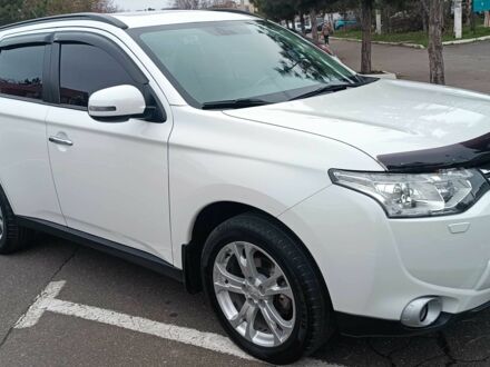 Білий Міцубісі Аутлендер, об'ємом двигуна 2.4 л та пробігом 112 тис. км за 15000 $, фото 1 на Automoto.ua