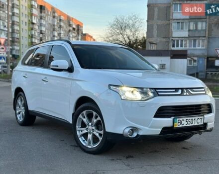 Белый Мицубиси Аутлендер, объемом двигателя 2.4 л и пробегом 77 тыс. км за 13800 $, фото 1 на Automoto.ua