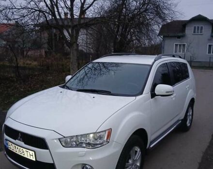 Белый Мицубиси Аутлендер, объемом двигателя 2.2 л и пробегом 181 тыс. км за 12300 $, фото 1 на Automoto.ua