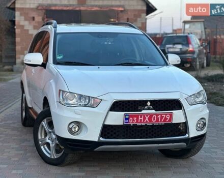 Белый Мицубиси Аутлендер, объемом двигателя 2.2 л и пробегом 243 тыс. км за 11498 $, фото 1 на Automoto.ua