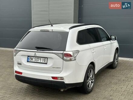Белый Мицубиси Аутлендер, объемом двигателя 2.27 л и пробегом 177 тыс. км за 11650 $, фото 1 на Automoto.ua