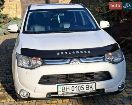 Білий Міцубісі Аутлендер, об'ємом двигуна 2.36 л та пробігом 240 тис. км за 11800 $, фото 1 на Automoto.ua