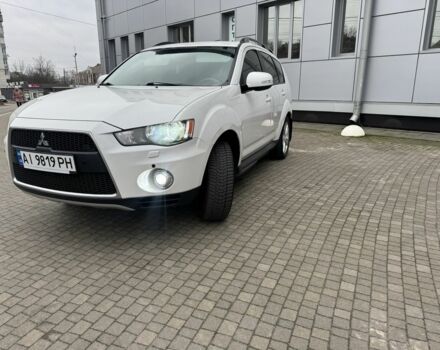 Білий Міцубісі Аутлендер, об'ємом двигуна 2.4 л та пробігом 174 тис. км за 12500 $, фото 1 на Automoto.ua