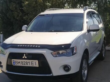 Білий Міцубісі Аутлендер, об'ємом двигуна 2.4 л та пробігом 167 тис. км за 12500 $, фото 1 на Automoto.ua