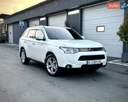 Білий Міцубісі Аутлендер, об'ємом двигуна 2.4 л та пробігом 154 тис. км за 12999 $, фото 1 на Automoto.ua