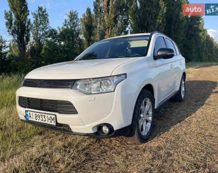 Білий Міцубісі Аутлендер, об'ємом двигуна 2.4 л та пробігом 168 тис. км за 10499 $, фото 1 на Automoto.ua