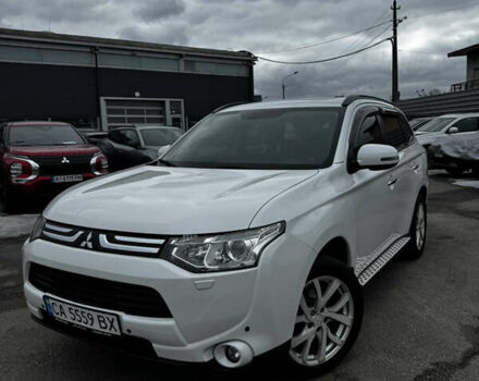 Белый Мицубиси Аутлендер, объемом двигателя 2.4 л и пробегом 247 тыс. км за 13400 $, фото 1 на Automoto.ua