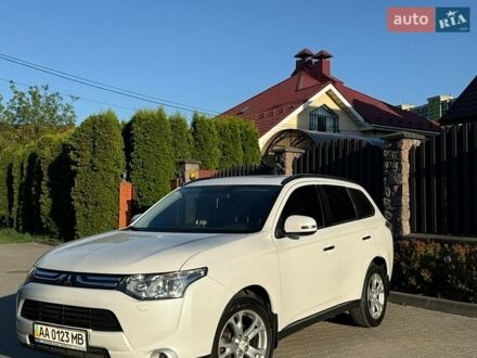 Белый Мицубиси Аутлендер, объемом двигателя 2.36 л и пробегом 163 тыс. км за 13500 $, фото 1 на Automoto.ua